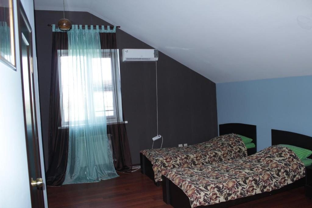 Двухместный (Двухместный номер Делюкс с 2 отдельными кроватями) отеля Ямайка, Оренбург
