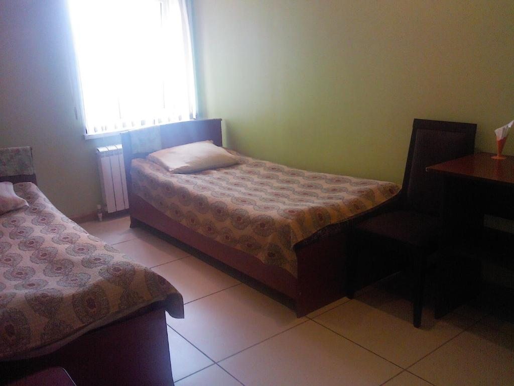 Двухместный (Бюджетный двухместный номер с 2 отдельными кроватями) мотеля У Виктора, Амерево