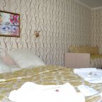 Семейный номер с одной большой и одной односпальной кроватью