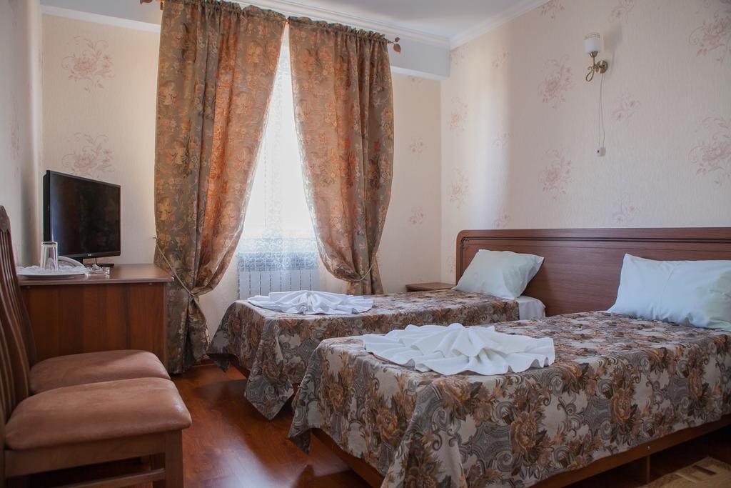 Двухместный (Двухместный номер с 1 кроватью или 2 отдельными кроватями) отеля Глория, Ессентуки