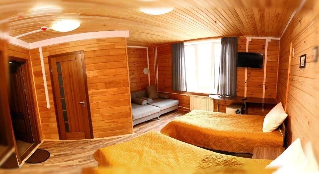 Двухместный (Улучшенный номер с 2 отдельными кроватями и видом на море) отеля Cозвездие Байкала, Листвянка