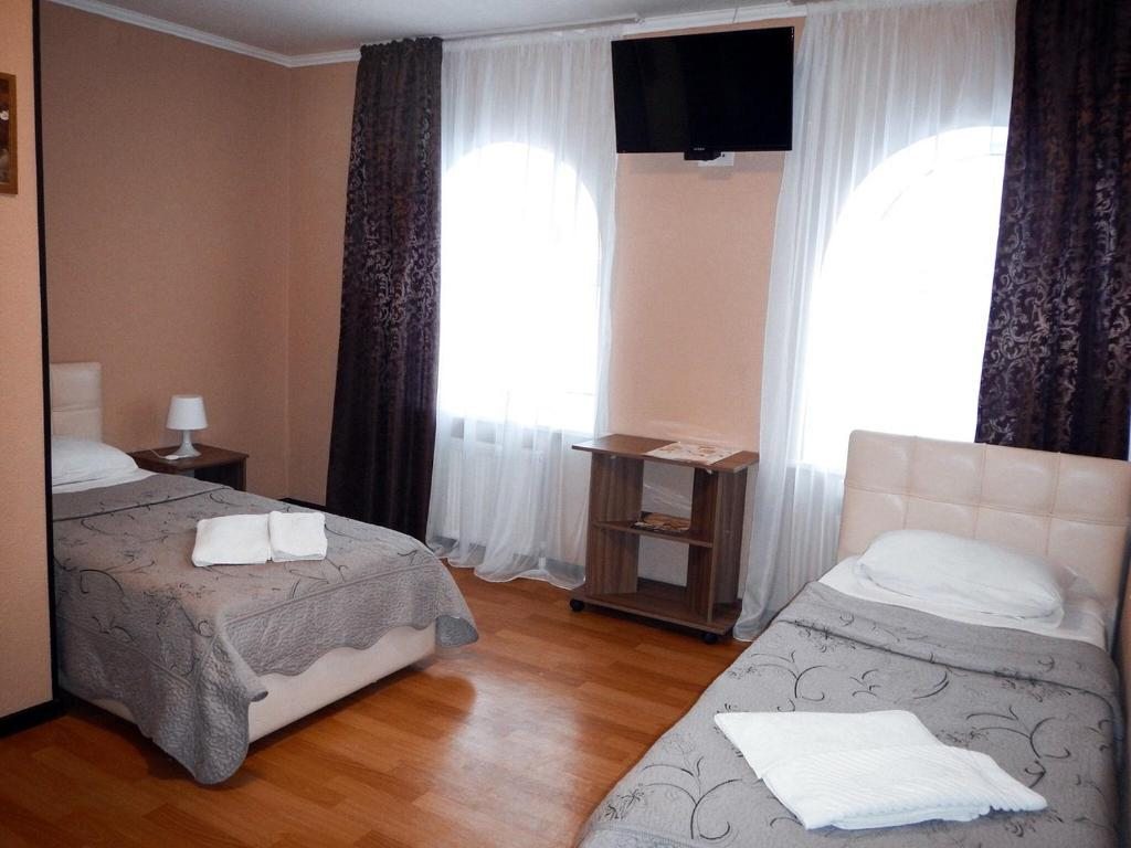 Двухместный (Двухместный номер с 2 отдельными кроватями и ванной комнатой) отеля Медем, Псков