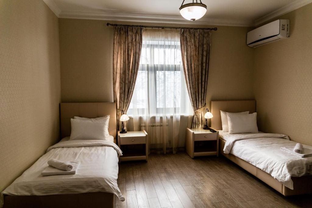 Двухместный (Стандартный двухместный номер с 2 отдельными кроватями) отеля Медный Двор, Суздаль
