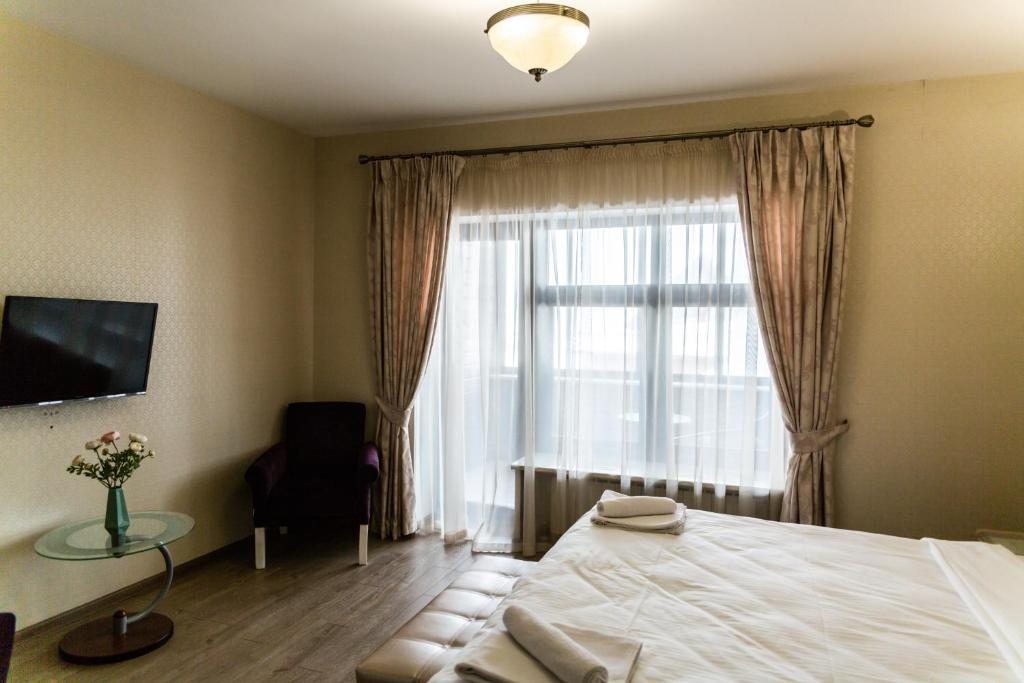Двухместный (Стандартный двухместный номер с 1 кроватью или 2 отдельными кроватями, вид на реку) отеля Медный Двор, Суздаль