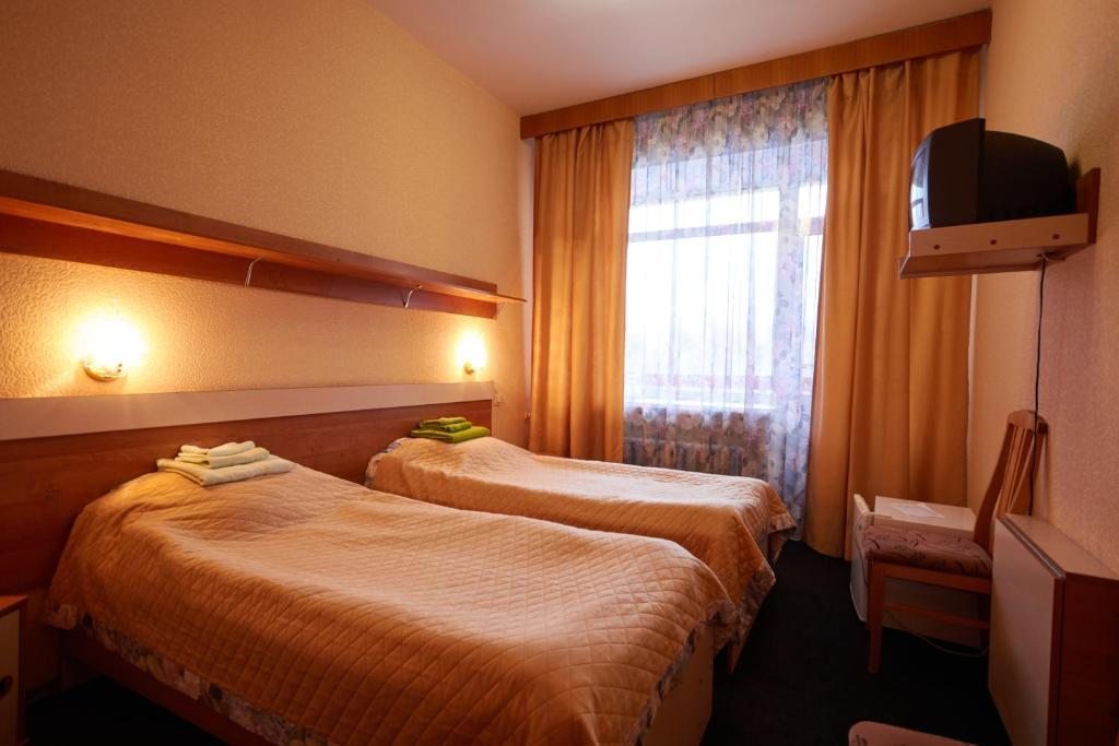 Двухместный (Стандартный двухместный номер с 2 отдельными кроватями) отеля Углич