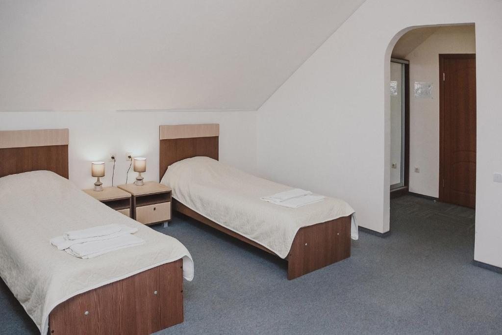 Двухместный (Стандартный двухместный номер с 1 кроватью или 2 отдельными кроватями) парк-отеля Хвалынская Жемчужина