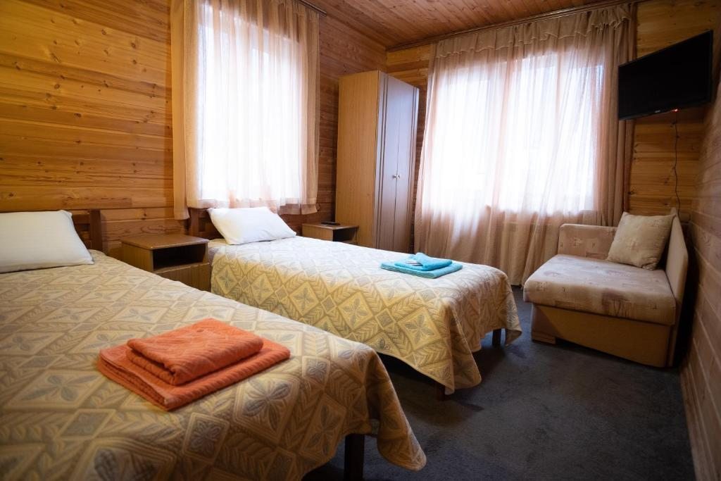Двухместный (Двухместный номер с 2 отдельными кроватями и видом на горы) отеля Суфруджу, Домбай