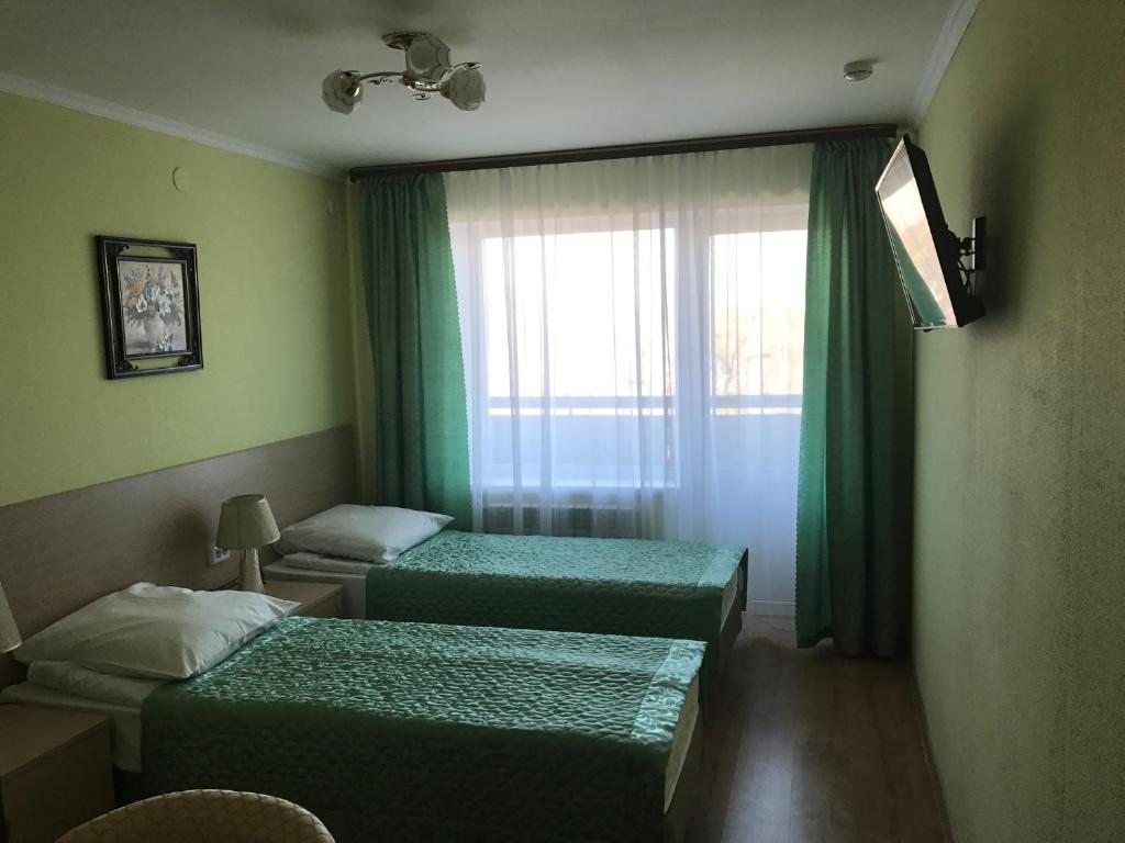 Двухместный (Улучшенный двухместный номер с 2 отдельными кроватями) санатория Долина Нарзанов Железноводск