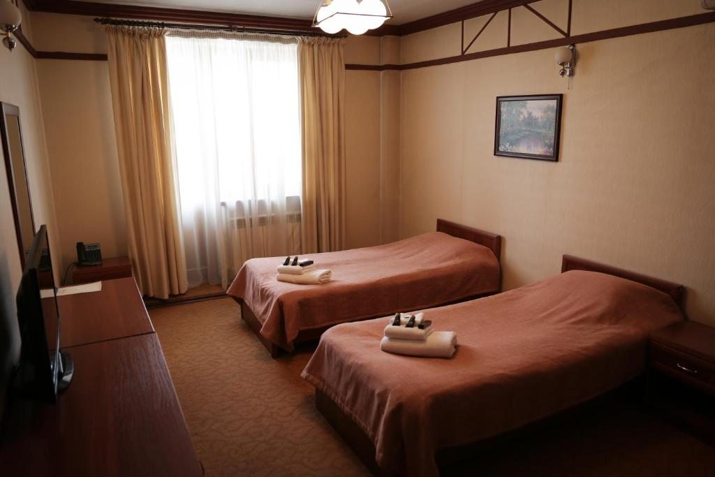 Двухместный (Стандартный двухместный номер с 1 кроватью или 2 отдельными кроватями) отеля Alpen Ville, Алматы