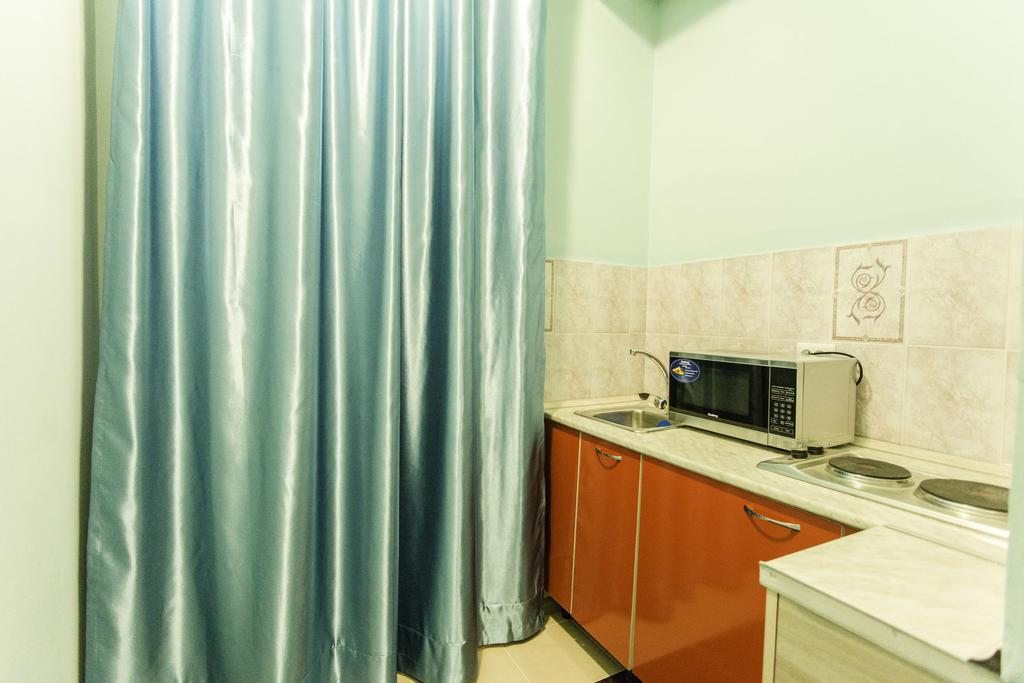 Апартаменты (Апартаменты с душем) апартамента Комфорт Алматы
