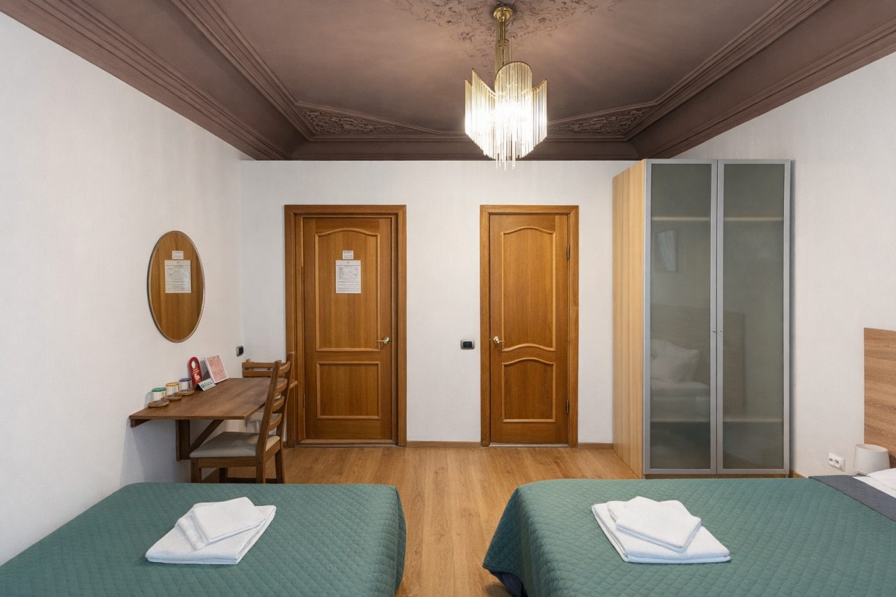 Четырехместный (Улучшенный комфорт с балконом), Гостевые комнаты и апартаменты Пио на Моховой