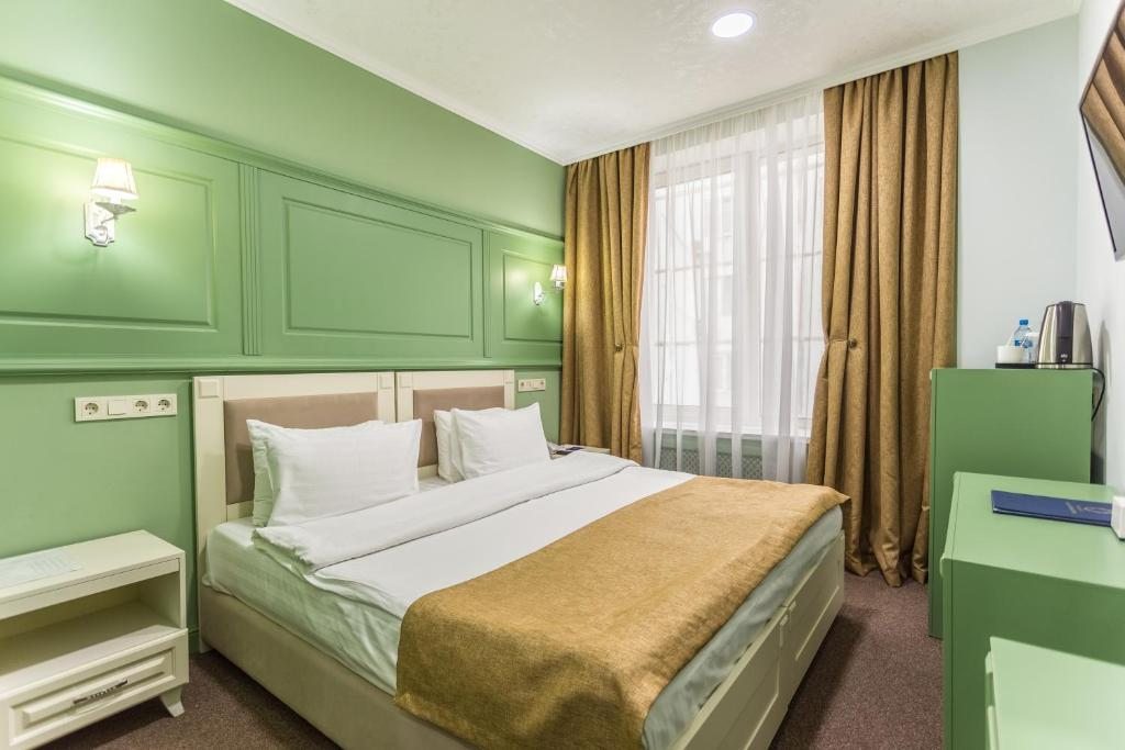 Двухместный (Улучшенный двухместный номер с 1 кроватью или 2 отдельными кроватями) отеля Grand Sapphire, Алматы