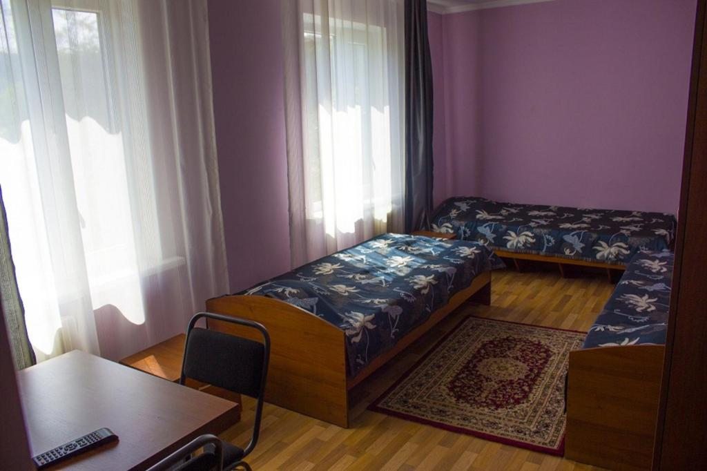 Номер (Односпальная кровать в общем номере) отеля Tahar, Алматы