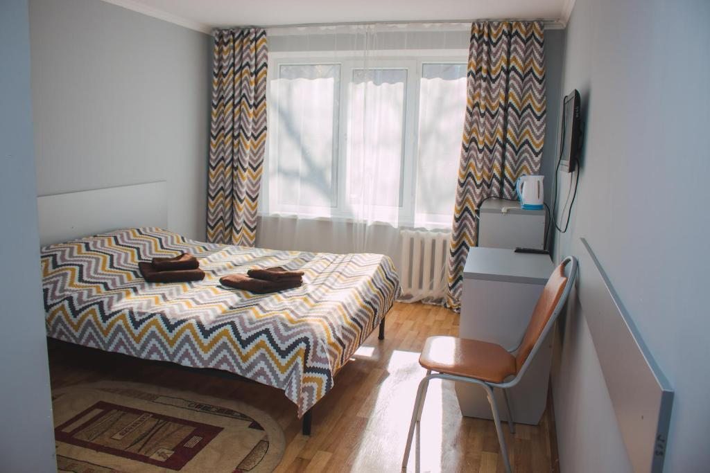 Двухместный (Большой двухместный номер с 1 кроватью) отеля Tahar, Алматы