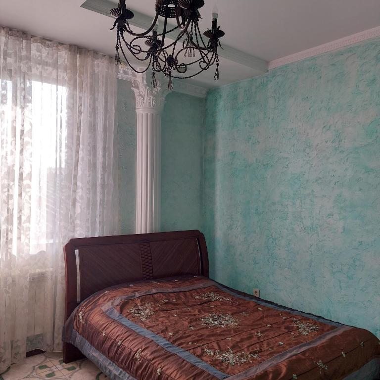 Двухместный (Двухместный номер Делюкс с 1 кроватью (для 2 взрослых и 1 ребенка)) отеля Little Shangri-La, Алматы
