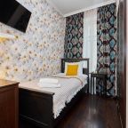 Уютный одноместный номер с лаконичным интерьером в спокойных