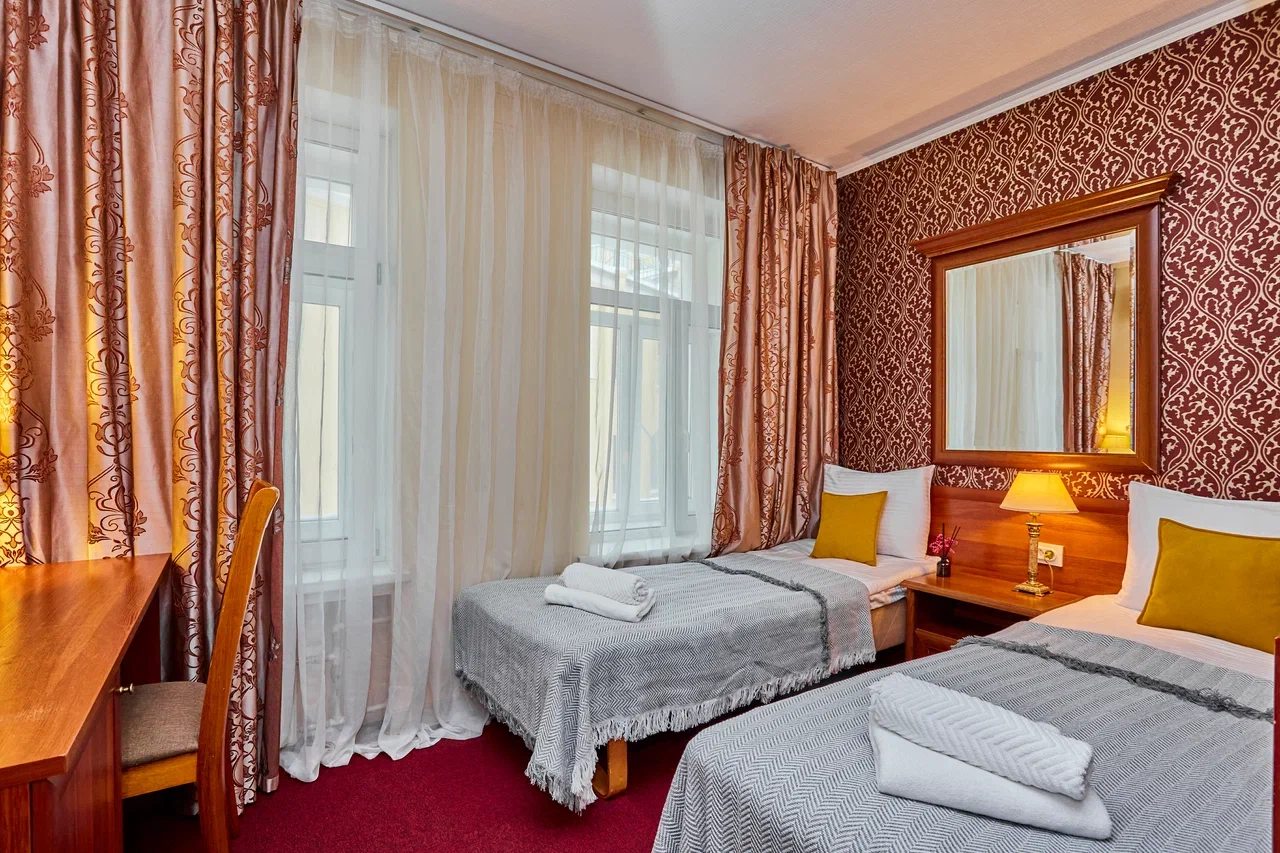 Современный номер с двумя кроватями