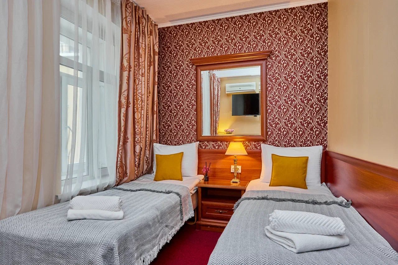 Современный номер с двумя кроватями