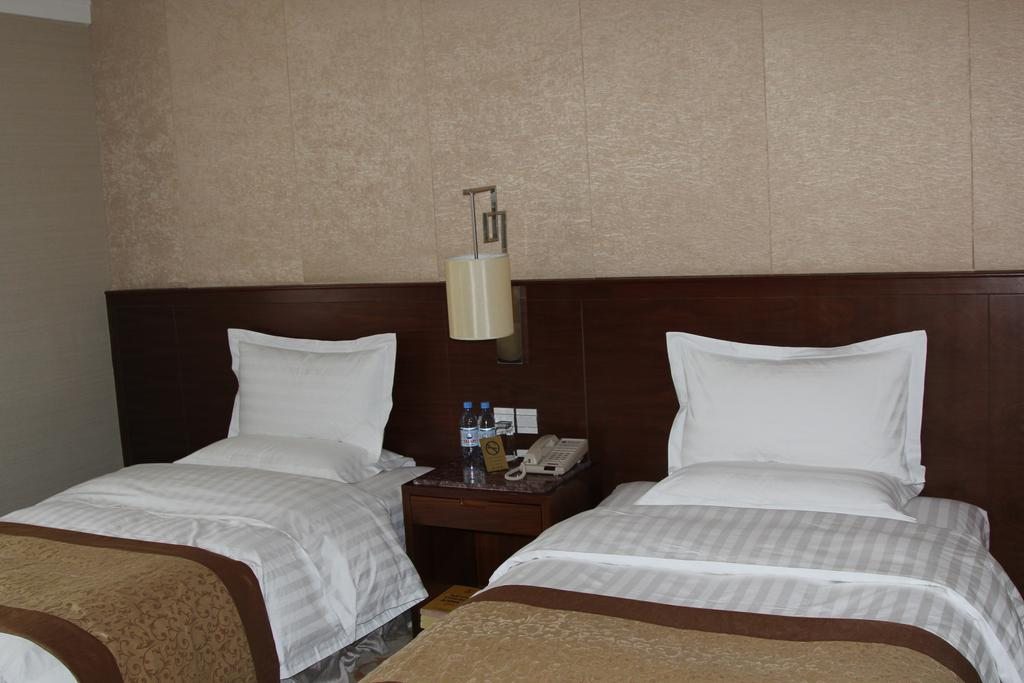 Двухместный (Стандартный двухместный номер с 2 отдельными кроватями) отеля Soluxe Алматы