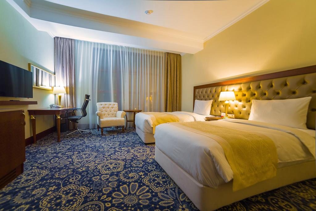Двухместный (Стандартный двухместный номер с 1 кроватью или 2 отдельными кроватями) отеля Рамада Алматы
