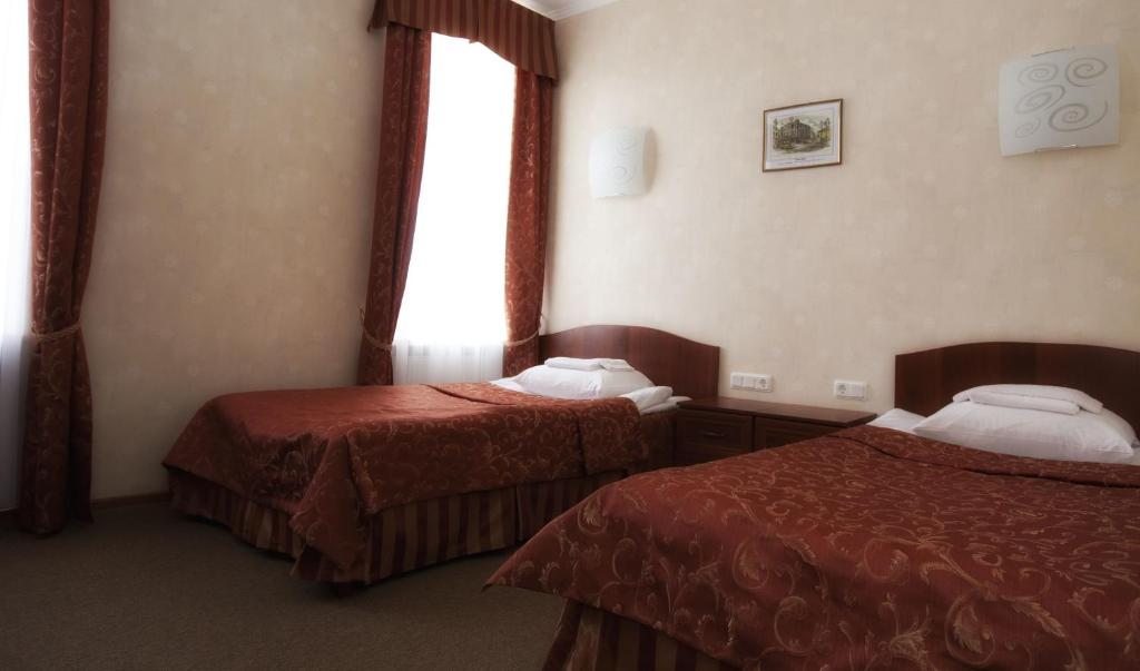 Стандартный двухместный номер с 2 отдельными кроватями в отеле «Инжэкон» 3*, Санкт-Петербург. Отель Инжэкон