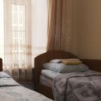 Двухместный номер эконом-класса с 2 отдельными кроватями и общей ванной комнатой в отеле «Ижэкон» 3*, Санкт-Петербург