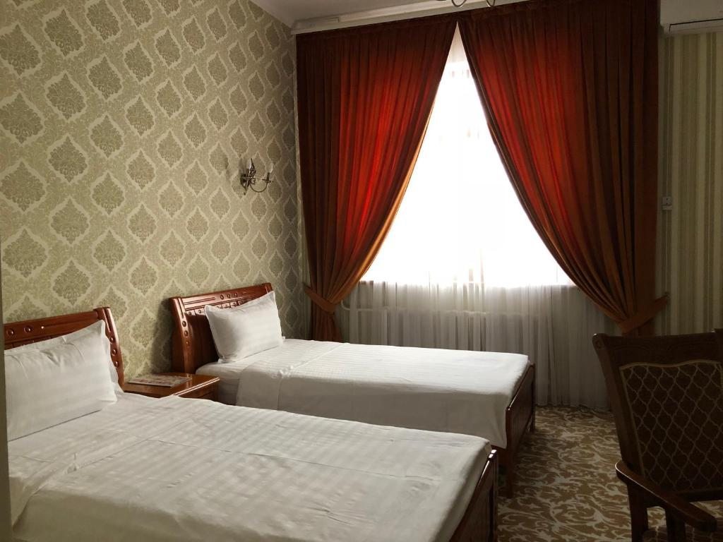 Двухместный (Бюджетный двухместный номер с 2 отдельными кроватями) отеля Tomiris, Астана