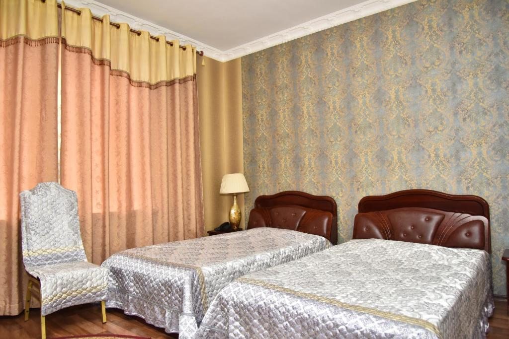 Двухместный (Двухместный номер с 2 отдельными кроватями и общей ванной комнатой) отеля Интерия, Астана