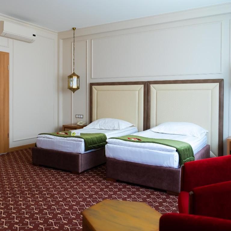 Двухместный (Стандартный двухместный номер с 2 отдельными кроватями) отеля Жумбактас Астана