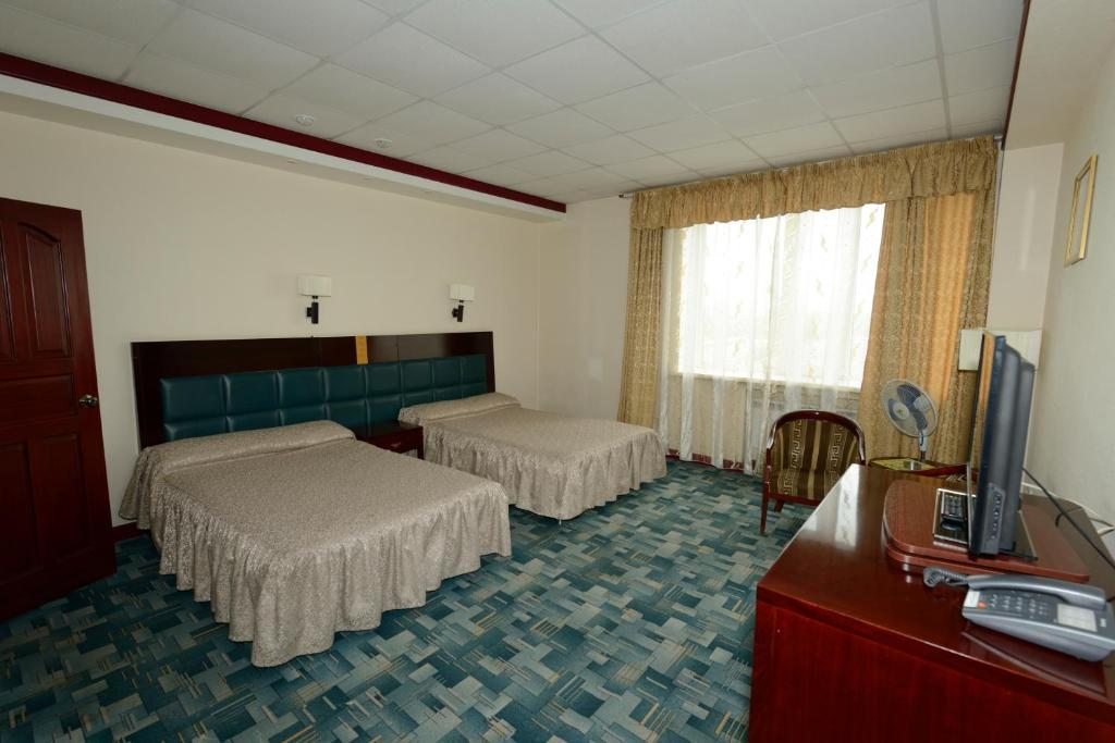 Двухместный (Стандартный двухместный номер с 2 отдельными кроватями), Отель Аврора