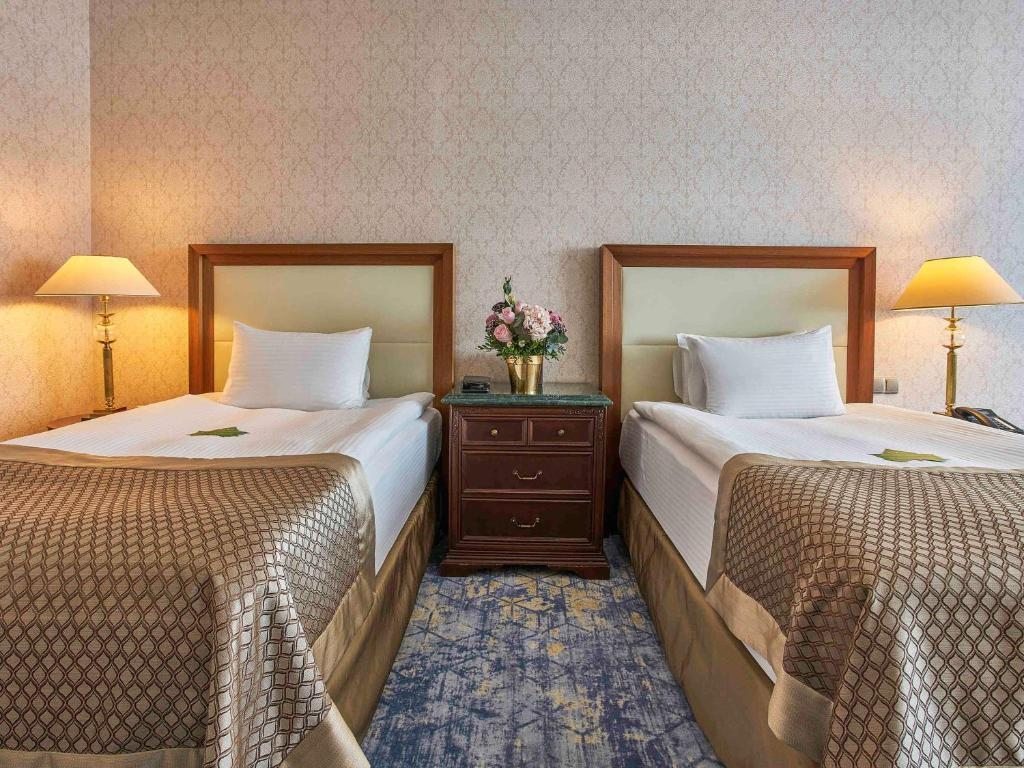 Двухместный (Двухместный номер Делюкс с 2 отдельными кроватями) отеля Rixos President, Астана