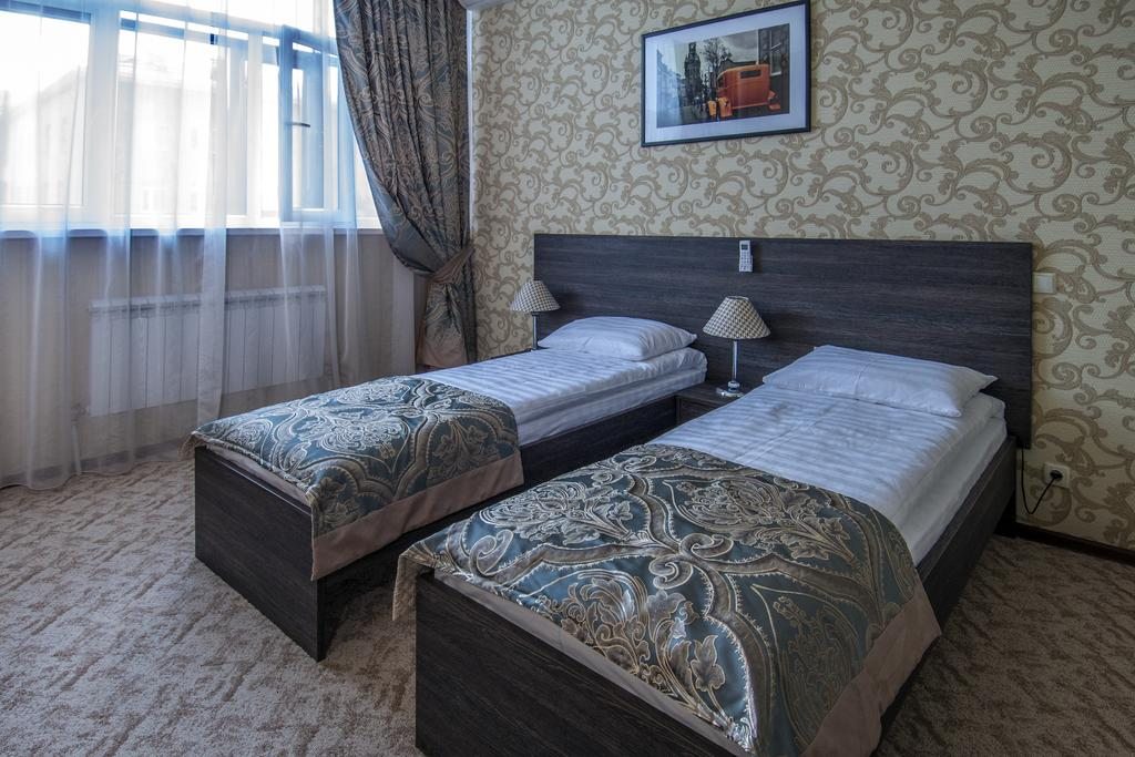 Двухместный (Двухместный номер с 2 отдельными кроватями и видом на город) отеля Sevenn Inn, Астана