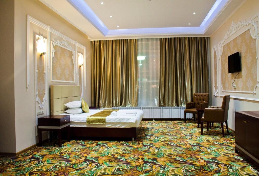 Двухместный (Улучшенный двухместный номер с 1 кроватью) отеля Sky Luxe, Астана