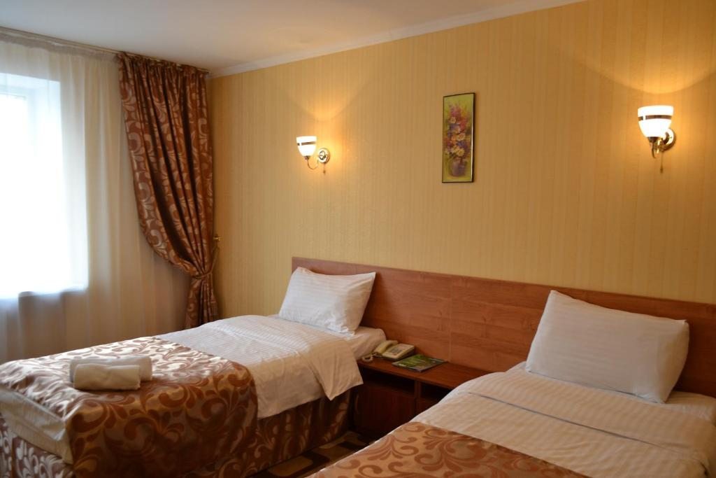 Двухместный (Двухместный номер с 2 отдельными кроватями) отеля Жасыбай, Астана