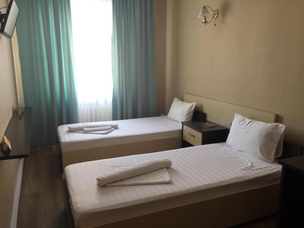 Двухместный (Стандартный двухместный номер с 2 отдельными кроватями) отеля Азамат, Астана