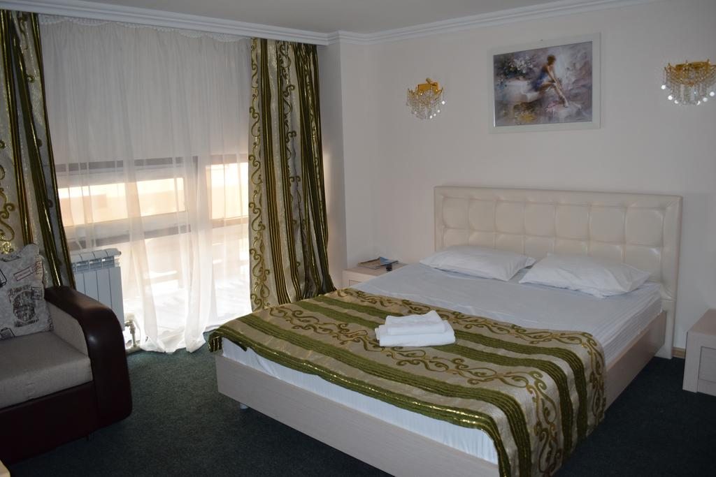 Двухместный (Улучшенный двухместный номер с 1 кроватью) отеля Байтерек, Астана
