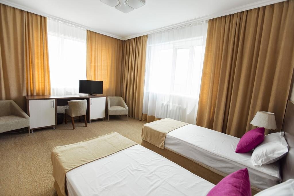 Двухместный (Улучшенный двухместный номер с 2 отдельными кроватями) отеля Кел Инн, Астана