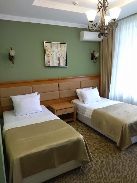 Двухместный (Стандартный двухместный номер с 2 отдельными кроватями) отеля Престиж, Астана