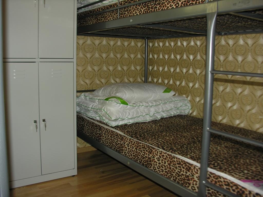 Номер (Спальное место на двухъярусной кровати в общем номере для мужчин) хостела Триумф Астана