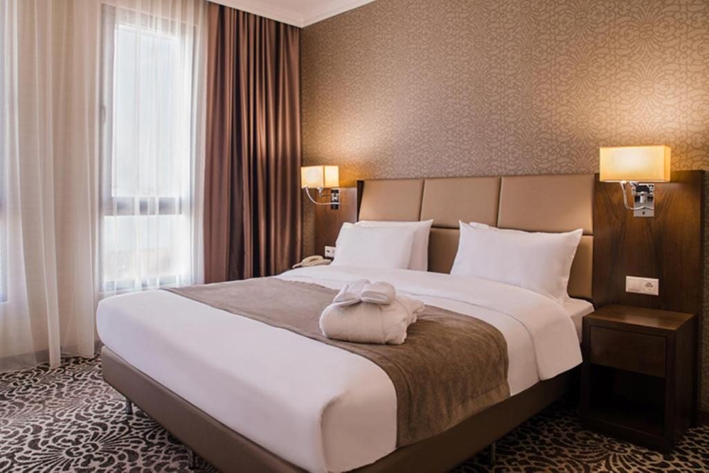 Двухместный (Номер с кроватью размера king-size – Подходит для гостей с ограниченными физическими возможностями) отеля Holiday Inn, Актау