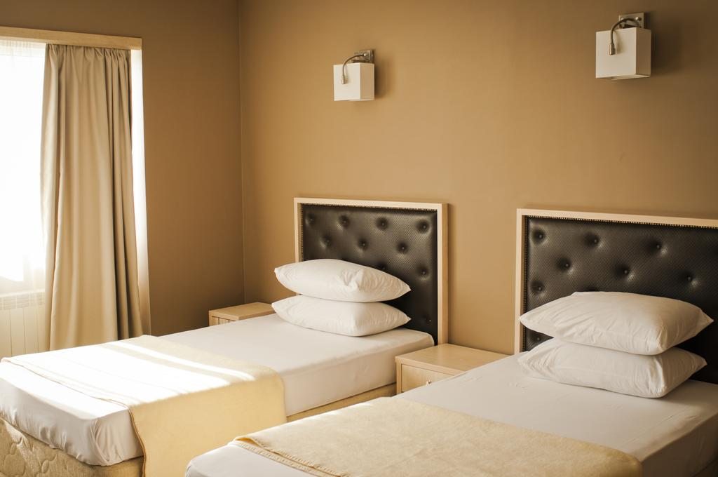 Двухместный (Двухместный номер с 2 отдельными кроватями) отеля Актау