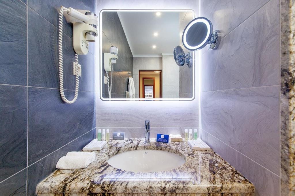 Ванная комната в отеле Crowne Plaza Krasnodar - Centre, Краснодар. Отель Crowne Plaza Krasnodar Centre