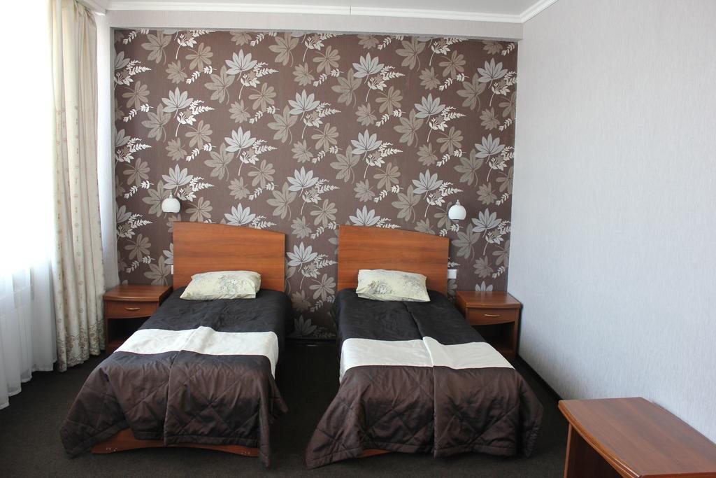 Двухместный (Двухместный номер с 2 отдельными кроватями) отеля Меридиан, Караганда
