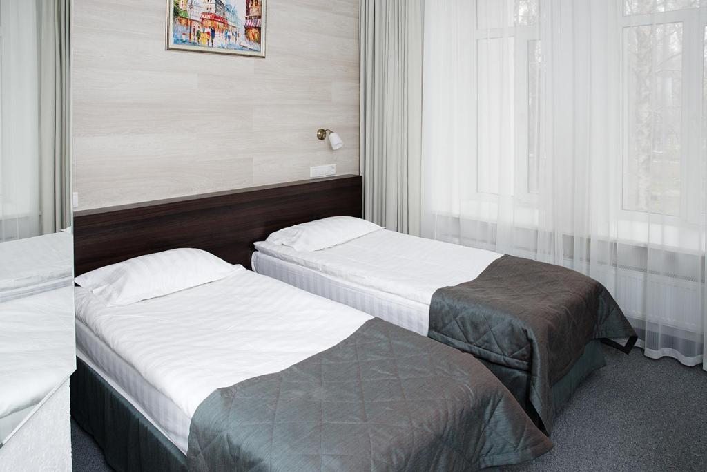 Двухместный (Улучшенный двухместный номер с 1 кроватью или 2 отдельными кроватями) отеля Чайка, Караганда