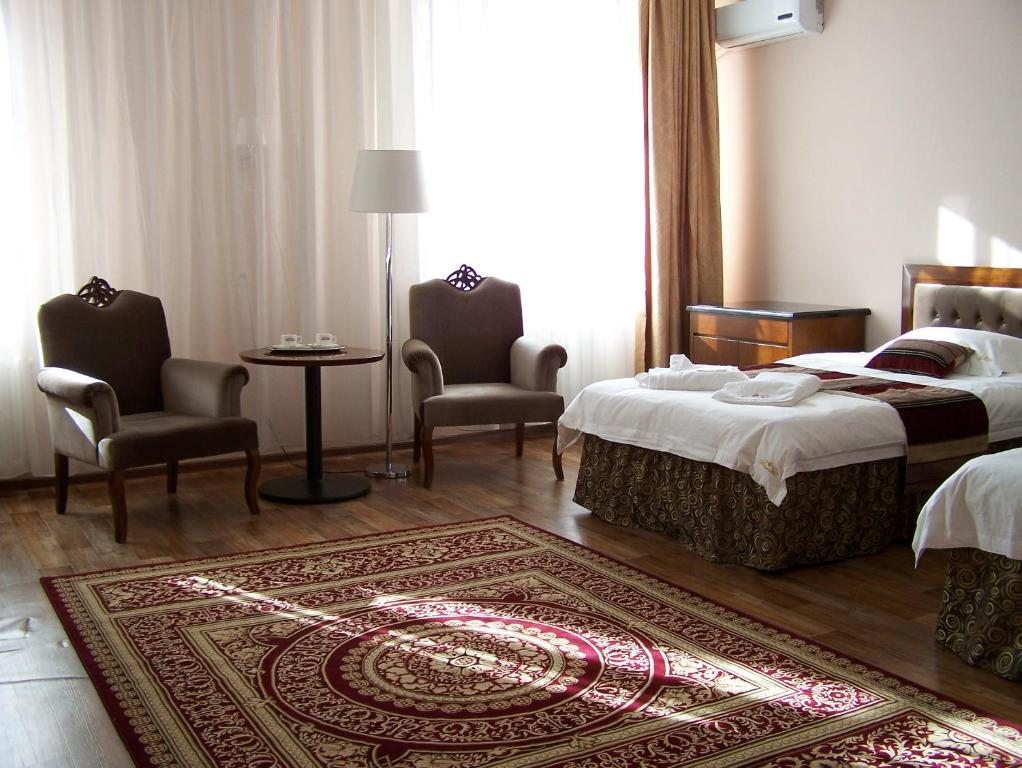 Двухместный (Стандартный двухместный номер с 2 отдельными кроватями) отеля Ainaline, Усть-Каменогорск