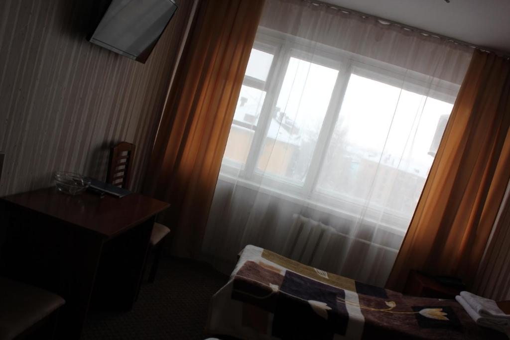 Двухместный (Стандартный двухместный номер с 2 отдельными кроватями) отеля Усть-Каменогорск