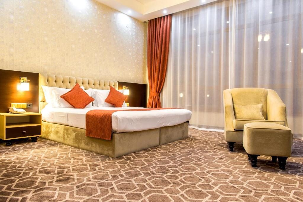 Двухместный (Двухместный номер Делюкс с 1 кроватью или 2 отдельными кроватями) отеля Мегаполис Шымкент