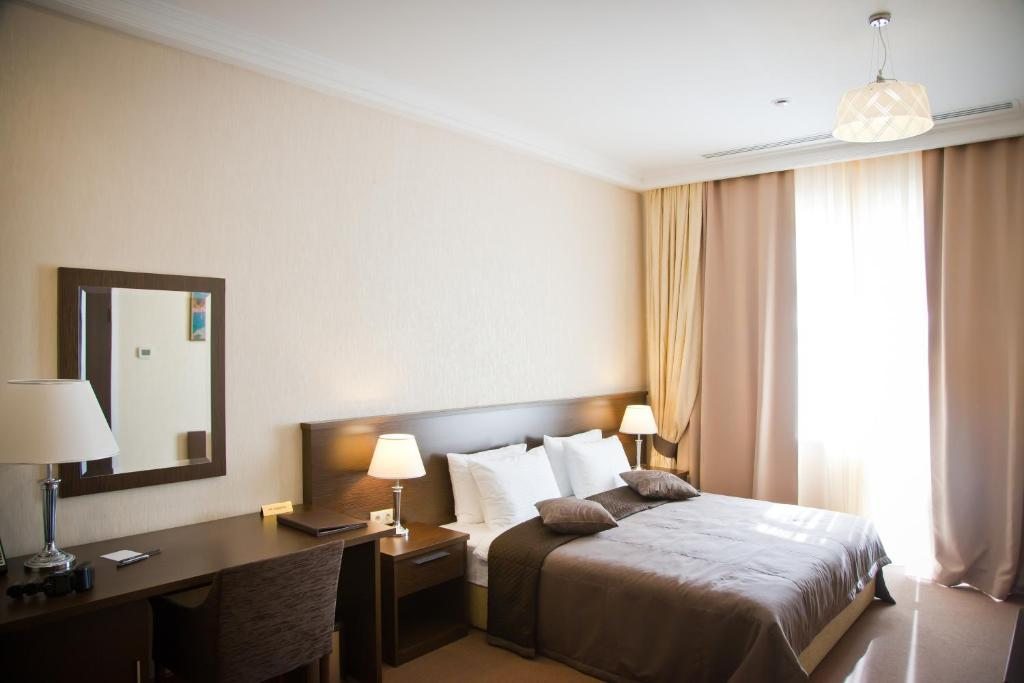 Двухместный (Улучшенный двухместный номер с 1 кроватью) отеля Кайнар, Шымкент