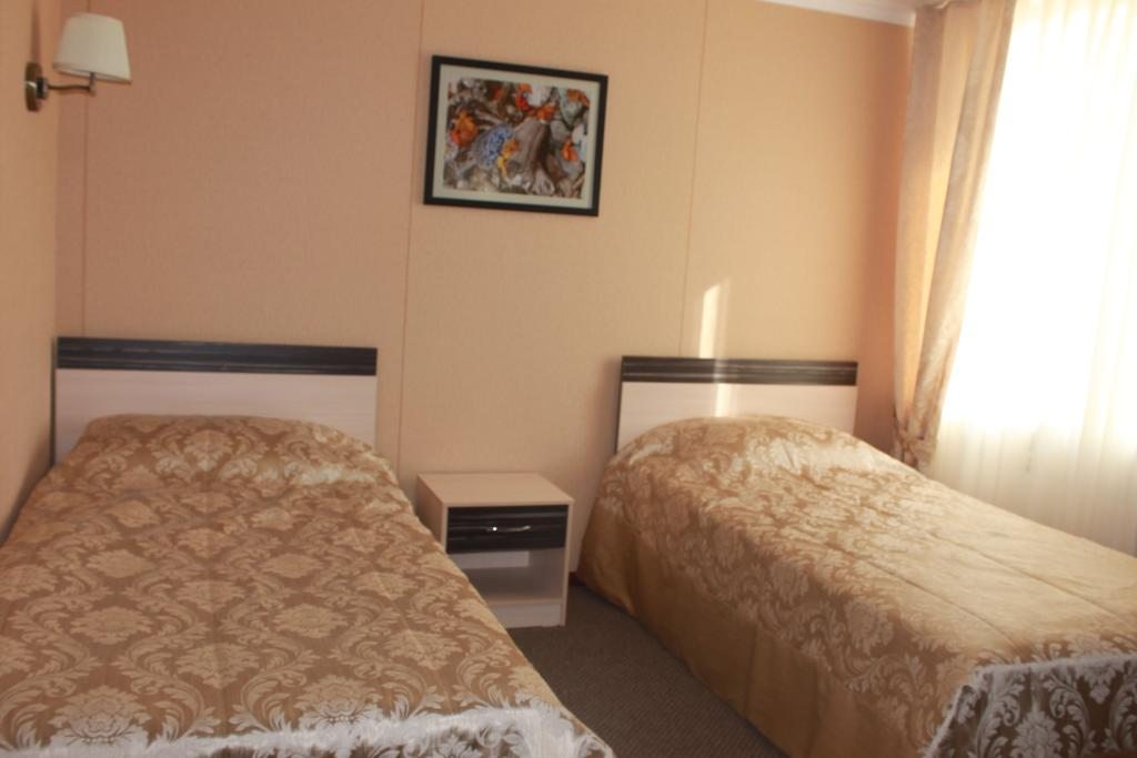 Двухместный (Стандартный двухместный номер с 2 отдельными кроватями) отеля Лаети Жайык, Атырау