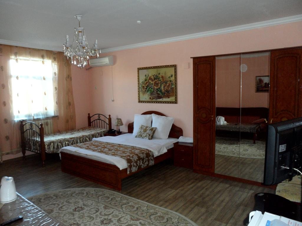 Двухместный (Двухместный номер Делюкс с 2 отдельными кроватями) отеля Mereke, Кызылорда